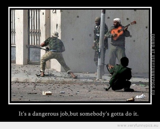 Funny Picture - Background music it's a dangerous job but somebody's gotta do it
