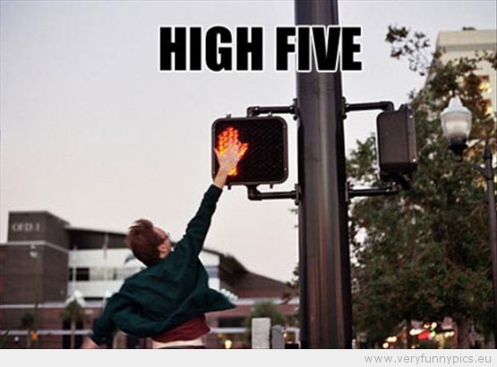 Funny Picture - High five motorcykle an stop light