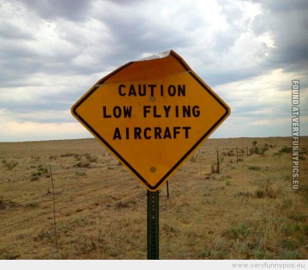 Funny Picture - Sign saying caution low flying aircraft
