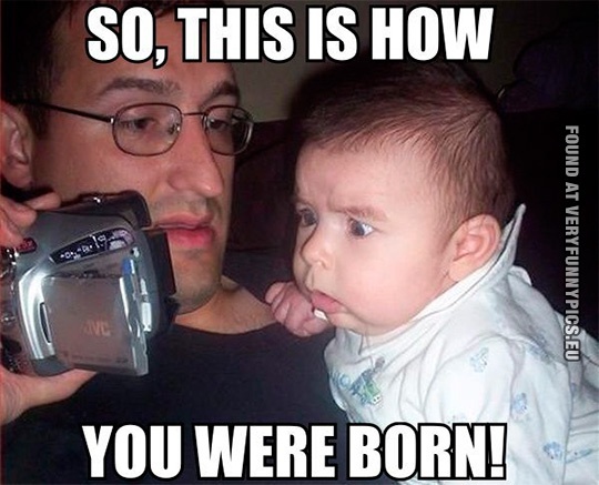 Funny Picture - So, this is how you were born - Chocked baby looking at video