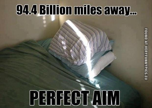 Funny Picture - Sun on pillow - 94.4 billion miles away... Perfect aim