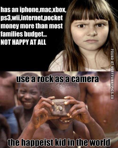 Funny Pictures - Use a rock as a camera - The happiest kid in the world