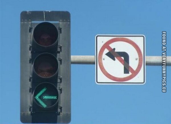 green light left no turning left sign