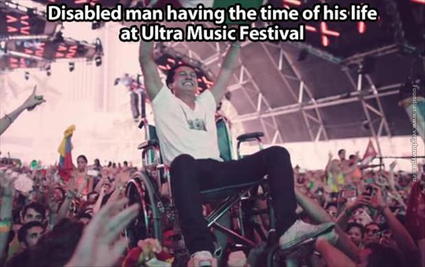 funny pics man in a wheelchair at concert