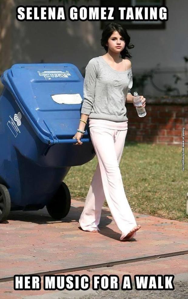 funny pictures selena gomez taking her music for a walk