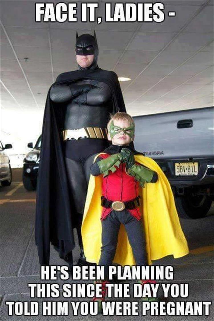 Dad dressed as batman with son dressed as Robin