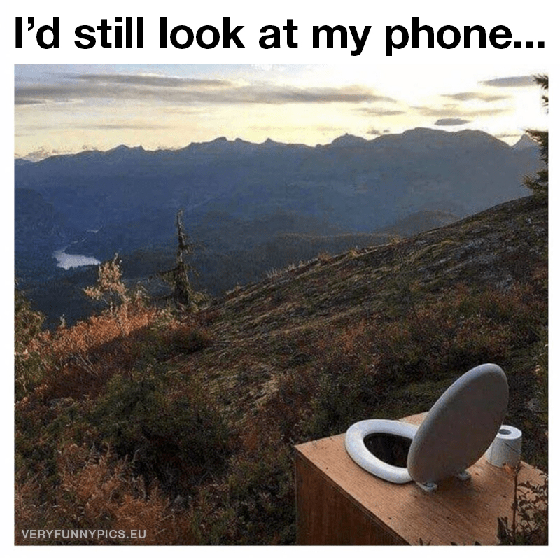 Toilet with view over mountains and lakes